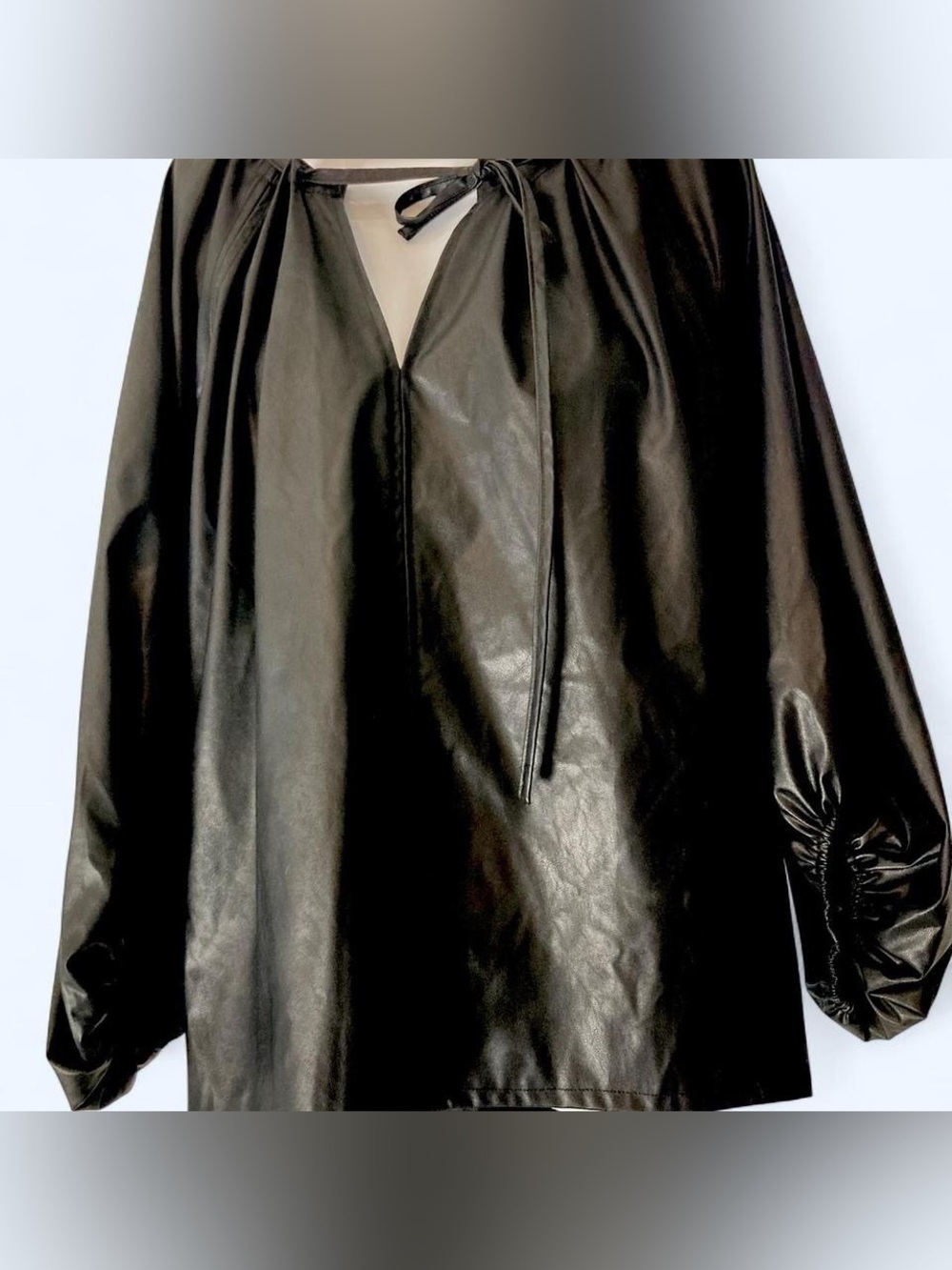 Black faux leather blouse with tie neck and balloon sleeves. Terra Sky 14W
